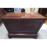 A Victorian mahogany sarcophagus shape Wine Cooler with beaded border and hinged lid, on