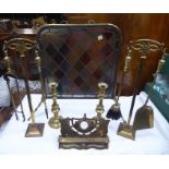 A brass Fire Screen with coloured and leaded glass panels, a pair of brass Implement Stands, a