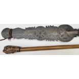A Cretan olive wood Stick carved with three faces and inscribed "Kepknpa", 28" (71cms) long, and a