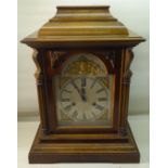 An early 20th century Mantel Clock with steel and brass dial, gong strike and architectural style