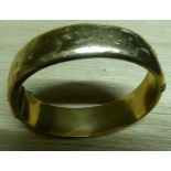 A 9ct engraved gold hollow Bangle, 25.4g.