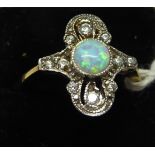 A silver gilt Art Deco design Ring with a centre opal.