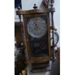 A late 19th century Wall Clock with steel dial in inlaid case, 2' 8" (86cms) high.