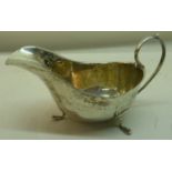 A silver Sauce Boat with loop handle and triple shaped supports, Sheffield 1931, 3 oz.