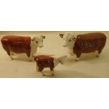 A Hereford Group of bull, cow and calf, nos. 1363B, 1360 and 1827C.