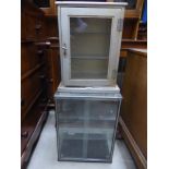 A glazed Shop Display Cabinet inscribed "Whitegrove Stores, The Headrow, Leeds", 18" (36cms) wide,