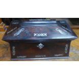 A Victorian rosewood Tea Caddy inlaid with mother of pearl, the interior fitted with two covered