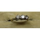 An 18ct gold Engagement Ring set with three diamonds.