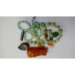 Fossil brooch, coral earrings, Jade etc.