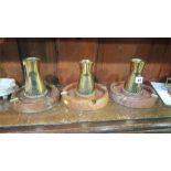 Set of three brass ashtrays