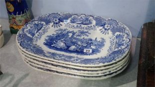 Set of five blue and white meat plates