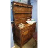 An oak linenfold dresser