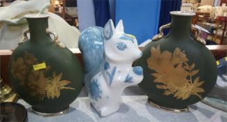 A pair of moon flasks and a squirrel money box and a Maling dish