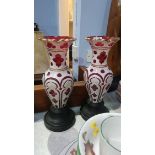 A pair of Victorian white flashed glass vases