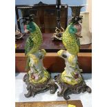 A pair of parrot candlesticks