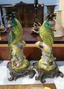 A pair of parrot candlesticks