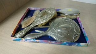 Various silver mounted brushes etc.