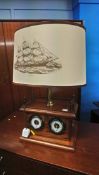 A table lamp and barometer