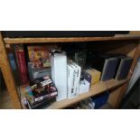 Various radios, DVDs etc. on one shelf