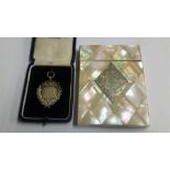 Mother of Pearl card case and a silver medal