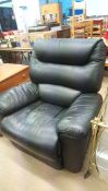 Large black reclining armchair