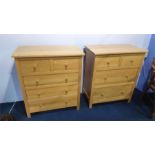 A modern pair of light oak chest of drawers