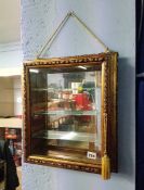 Gilt framed display cabinet