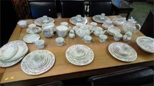A comprehensive Royal Doulton 'Woodland Rose' tea, coffee and dinner service