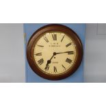 An LMS mahogany cased fusee wall clock, R. Jones and Co. of London