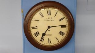 An LMS mahogany cased fusee wall clock, R. Jones and Co. of London