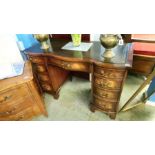 A good reproduction mahogany inset leather writing desk, 115cm wide