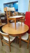 Circular teak table and four chairs