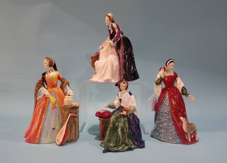 Four Royal Doulton figures 'Catherine of Aragon', 'Catherine Howard', 'Jane Seymour' and 'Anne