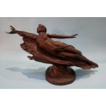 An Art Deco style bronze of a Lady with arms outstretched riding on a cloud.