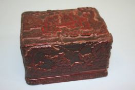A Chinese Cinnabar lacquer box and cover. 8 cm high