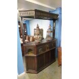 An Old Charm carved oak bar, 155cm wide, 190cm high, 39cmn deep