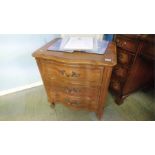 A pair of American bedside chest of drawers, 60cm wide