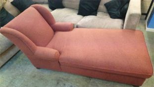 A long armchair / day bed, recently recovered in terracotta fabric