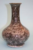 A large Chinese speckle glaze bottle vase. 33 cm high