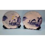 Pair of blue and white Oriental plates, 22cm diameter