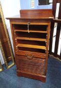 A mahogany tambour front filing cabinet with slide out drawers, 50cm wide