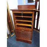 A mahogany tambour front filing cabinet with slide out drawers, 50cm wide