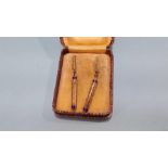 Pair of earrings in the form of prayer scrolls, stamped 585, 3.3 grams