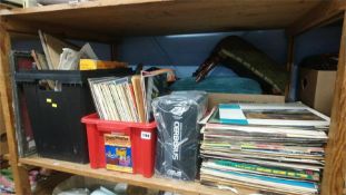 Shelf of assorted including LPs etc.