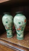 Pair of Oriental vases, with enamelled decoration