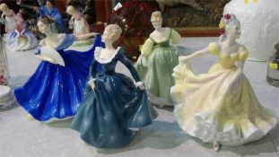 Four Royal Doulton figures 'Fair Lady' etc.
