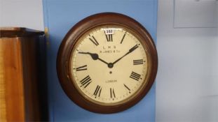 An L.M.S mahogany railway clock by Jones and Co of London, with fusee movement
