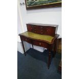 A reproduction mahogany ladies writing desk