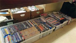 Three trays of DVDs and Blu Ray discs