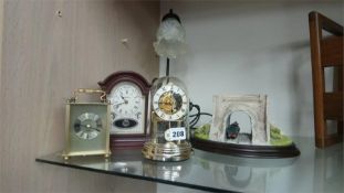 Various mantle clocks, a lamp etc.